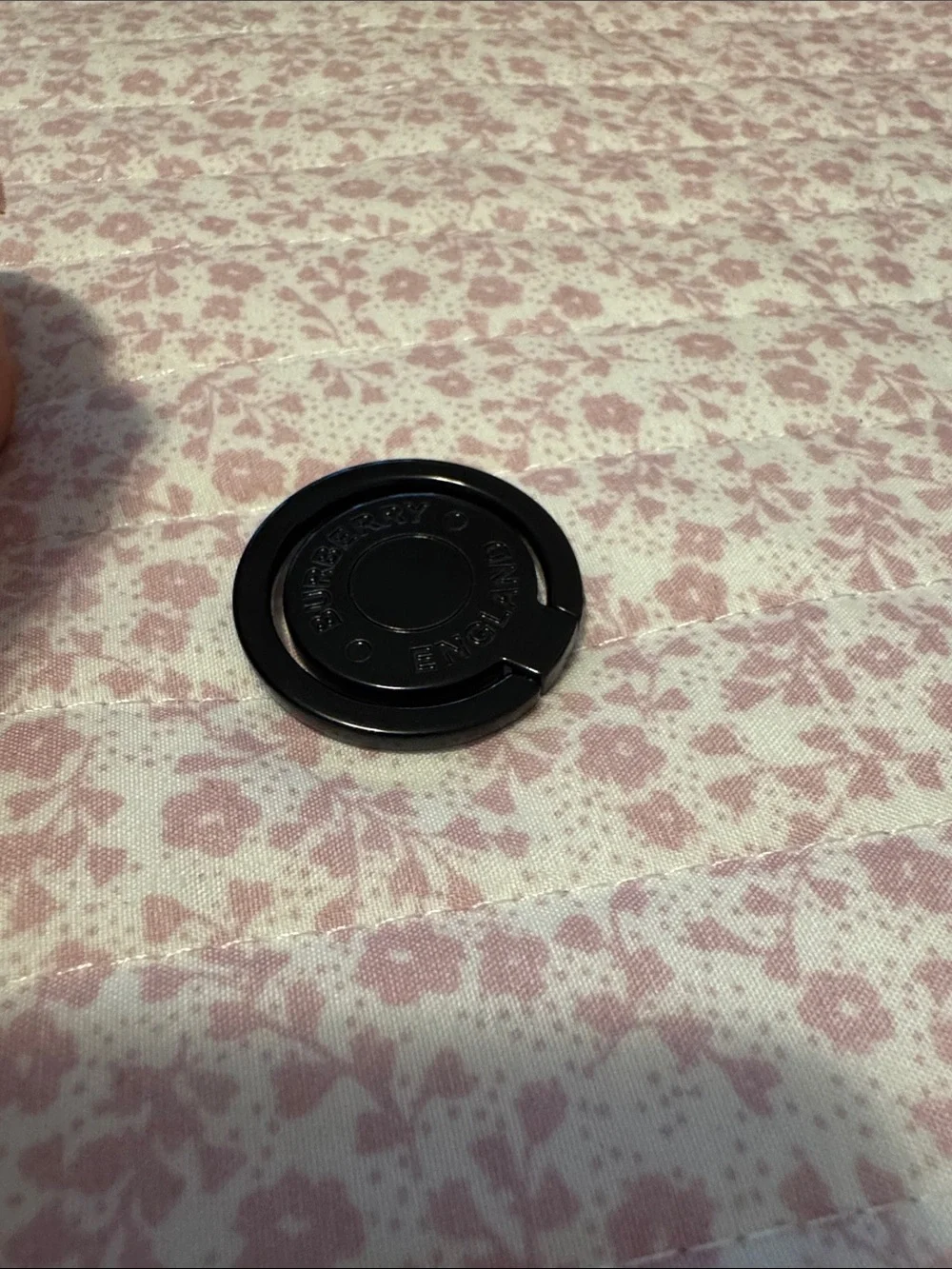 Burberry Black Rotating Phone Ring Holder with Branded Accent